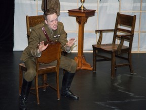 Kyle Blair (as Billy Bishop) performs a scene from Billy Bishop Goes To War at the McManus Theatre in London, Ont. on Tuesday February 25, 2014. (DEREK RUTTAN, The London Free Press)