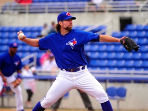 Blue Jays pitcher R.A. Dickey in the team's 2014 spring training home opener. (David Manning-USA TODAY Sports)