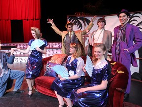 Actors perform a scene from the Manitoba Theatre for Young People's production of the Mikado during a dress rehearsal in Winnipeg, Man. Thursday February 27, 2014.(Brian Donogh/Winnipeg Sun/QMI Agency)