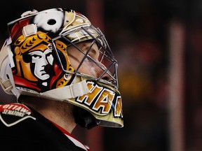 Ottawa Senators' Andrew Hammond looks up at the score board during a break in play against Detroit Red Wings in the second period during NHL action at the Canadian Tire Centre in Ottawa, Ont. on Thursday February 27, 2014. Hammond replaced Lehner after he allowed 6 goals. Darren Brown/Ottawa Sun/QMI Agency