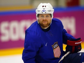 Men’s ice hockey player Phil Kessel of the U.S. watches his teammates take shots during a team practice at the 2014 Sochi Winter Olympics February 20, 2014.  (BRIAN SNYDER/Reuters)