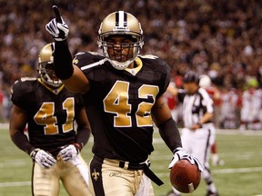 Darren Sharper of the New Orleans Saints reacts after he broke up a passing play by the Arizona Cardinals during the NFC Divisional Playoff Game at Louisana Superdome on January 16, 2010. (Chris Graythen/Getty Images/AFP)