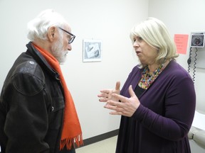 Ontario Health Minister Deb Matthews speaks with Timothy James Buck, a patient at West London Family Clinic. The clinic is part of the Thames Valley Family Health Team, which will play the lead trying to get doctors, pharmacists, hospital and community groups to coordinate their care for patients with complex needs that would otherwise require frequent trips to the ER and hospital. The program, called Health Link, has been rolled out in 47 communities. (JONATHAN SHER, The London Free Press)