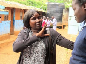 Londoner Abeny Nuol, left, chats with Rebecca Nyibol at a school for South Sudan refugees in Kenya supported by Canadian Aid for Southern Sudan. (Jane Roy photo)