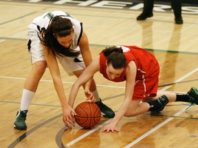 The Spruce Grove senior girls Panthers (white) had a bit of trouble controlling the ball, and the game, in their outing against the Scona Lords on Feb. 19, as they fell 59-57. The loss marked the first of the league season for the Panthers who simply couldn’t score on a number of chances. - Gord Montgomery, Reporter/Examiner