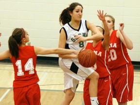 Sydney Kumar of the Panthers has the ball knocked from her hands as she heads towards the basket during her team’s game against the Scona Lords. The Lords won 59-57 ending the Grove’s unbeaten league streak at nine games. - Gord Montgomery, Reporter/Examiner