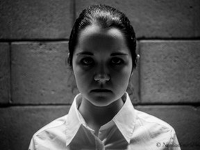 Nicole Welsh plays O'Brien in the Colliding Scopes production of The Condition, a different take on George Orwell's classic novel 19984. (Nicolaas Smith)