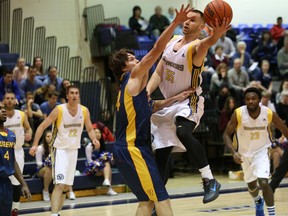 Laurentian University's Alex Ratte, pictured here going up for a shot against Queen's during OUA action at Ben Avery gymnasium Jan. 18, was named to the OUA second all-star team Thursday.