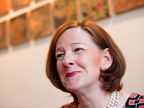 Alberta Premier Alison Redford speaks with the Edmonton Sun's Matt Dykstra at Credo Coffee at 10134 104 Street in Edmonton, Alta., on Wednesday, Feb. 26, 2014. (Ian Kucerak/Edmonton Sun/QMI Agency)