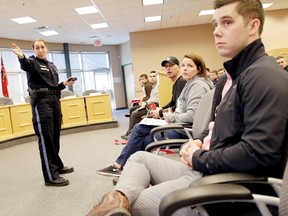 The OPP East Region recruiting officer Cst. Sylvie Cote speaks to a full house at Quinte West city hall Thursday about what it takes to become an OPP officer. 
Emily Mountney/The Intelligencer