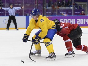 Nicklas Backstrom (in yellow) tested positive for the stimulant pseudoephedrine at the Olympic Games and was held out of the men's hockey gold medal game. But why are people saying he's a victim?   AFP PHOTO / JONATHAN NACKSTRAND