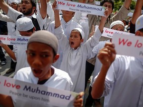 Several hundred Muslims gathered in front of the U.S. embassy in Bangkok and in a shopping district where Google has an office, to protest against an anti-Islam film considered insulting to Prophet Mohammad, and to call on Google and YouTube to ban it from their websites.  

REUTERS/Damir Sagolj