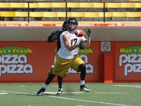 Liam Mahoney  in action at the  Hamilton Tiger Cats  mini-camp  held at Ivor Wynne Stadium in Hamilton this week.  Today , more drills  April 19, 2012.  Stan Behal/QMI Agency