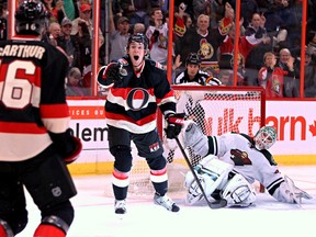 Ottawa Senator Kyle Turris looks to Clarke MacArthur after scoring against the Minnesota Wild during NHL action in Ottawa, Ont. on Wednesday November 20, 2013. Errol McGihon/Ottawa Sun/QMI Agency