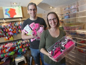 Scott and Crystal Burton run a home-based business called Tree Hugger cloth pads.  (Chris Procaylo/Winnipeg Sun)