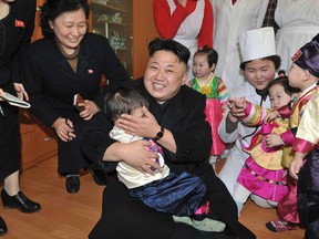 North Korean leader Kim Jong Un visits an orphanage in this undated photo released by North Korea's Korean Central News Agency (KCNA) in Pyongyang in February 4, 2014. (REUTERS/KCNA/File)