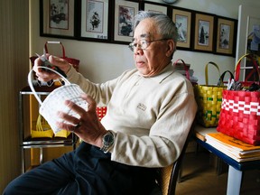 Harvey Chan, 84, makes baskets for charity at his home in Thornhill on March 1, 2014 (Stan Behal/Toronto Sun)