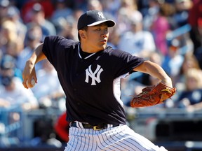New York Yankees pitcher Masahiro Tanaka throws during the fifth inning against the Philadelphia Phillies at George M. Steinbrenner Field Saturday. (Kim Klement/USA TODAY Sports)