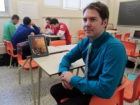 Grade 11 sudents work during class time at St. Pius X High School on Thursday Feb 13, 2014.  St. Pius X is one of the city's most improved schools according to the Fraser Report. Teach Brett Walker is shown here with his class.
Tony Caldwell/Ottawa Sun/QMI Agency