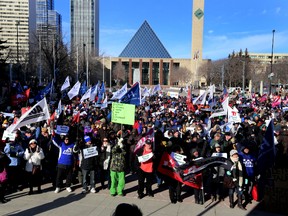 People from across Alberta take part in a major pension rally organized by the Labour Coalition on Pensions this Sunday, March 2, at Sir Winston Churchill Square in Edmonton, Alberta on Sunday, March2, 2014.  Hundreds of people were bused in from Calgary, Red Deer, and Fort MacMurray.  Perry Mah/ Edmonton Sun/ QMI Agency