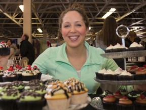 Kirsten Rhodes, owner of Cuppycakes by Kirsten, is a first time vendor at She Creates … One of a Kind Show and was amazed at the amount of people in attendance. She sold out of her cupcakes before the end of the day. (Julia McKay/The Whig-Standard)