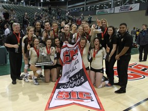 University of Manitoba Bisons women's volleyball team players, coaches and staff celebrate after beating the UBC Thunderbirds to win their first CIS women's volleyball crown since 2002. CHRIS ZUK/Bison Sports