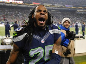 Seattle Seahawks cornerback Richard Sherman (25) celebrates after defeating the San Francisco 49ers in the NFC Championship game at CenturyLink Field. (Steven Bisig/USA TODAY Sports)