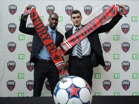 Ottawa Fury FC Chad Bush, right, is seen here with Pierre-Rudolph Mayard. Tim Baines/Ottawa Sun