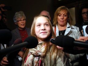 Madi Vanstone, her mom Beth and 50 school children at Queen's Park in Toronto to appeal to Premier Kathleen Wynne to fund a necessary cystic fibrosis drug Monday March 3, 2014. (Stan Behal/Toronto Sun)