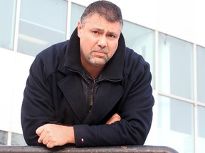 Corey Walsh of the Durham Regional Police poses for a picture outside the court house in Winnipeg, Man. Monday March 03, 2014. Walsh was sexually abused by a neighbour when he lived in Thompson, Man. as a child. The Crown is asking for a ten year sentence for 72 year old accused Robert Walker. (Brian Donogh/Winnipeg Sun/QMI Agency)