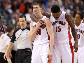 Raptors forward Tyler Hansbrough (left) and teammate Amir Johnson can use some days off to relax. Johnson, more specifically, could use time off to rest his sore ankle. (USA TODAY)