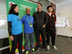 FIFA delegates Renata Lingor (Germany), Adilson Galdino dos Santos (Brazil), James Moorhouse (U.S.A.) and Fred Li (China) were in Edmonton Monday to check out Commonwealth Stadium. (Perry Mah, Edmonton Sun)