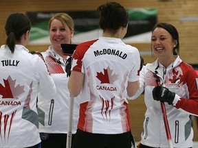 The Kelsey Rocque rink celebrates its semifinals win over Korea Monday. (World Curling Federation)
