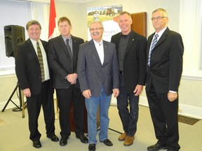 Left to right: Bob Guy (General Manager, Ontario Broiler Hatching Egg and Chick Commission); Henry Zantingh (Chair, Chicken Farmers of Ontario); Minister of Agriculture Gerry Ritz; Jack Greydanus (Chair, Canadian Hatching Egg Producers); Roelef Meijer (Chair, Canadian Poultry Research Council)