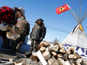 A teepee sits in the middle of Shannonville Road, south Hinchey Road and Airport Parkway, in Tyendinaga Township after protesters erected two barricades in the area Monday, March 3, 2014. Protesters are demanding an inquiry into the hundreds of missing Native women across the country. - JEROME LESSARD/The Intelligencer/QMI Agency