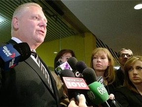 Councillor Doug Ford speaks to reporters at City Hall on Tuesday. (DON PEAT/Toronto Sun)