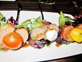 Stages’ Five Fork Banger – a selection of five fork-skewered sausage slices, mixed with greens.