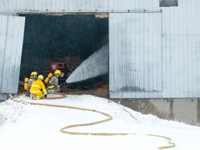 Pigs from inside the building were removed as heavy machinery was used to excavate smoldering piles of hay from the structure. The extend of the damage is unknown at this point.

CRAIG GLOVER/QMI AGENCY