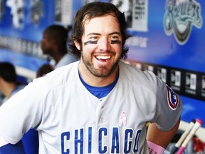 Ian Stewart, formerly of the Chicago Cubs, celebrates in the dugout after hitting a solo home run in the top of the fifth inning against the Milwaukee Brewers at Miller Park on May 13, 2012 in Milwaukee, Wisconsin. (Mike McGinnis/Getty Images/AFP)