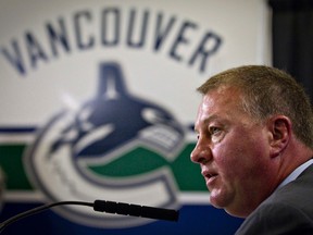 Canucks GM Mike Gillis should have received more for goaltenders Roberto Luongo — dealt to Florida on Tuesday — and Cory Schneider, who went to the Devils in the summer. (REUTERS)