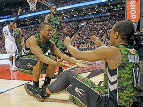 Raptors guards DeMar DeRozan (right) and Kyle Lowry could need some rest. (MICHAEL PEAKE/Toronto Sun)