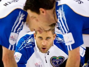 Team British Columbia skip John Morris guides his rock against Team Northwest Territories/Yukon during the 2014 Brier curling championship in Kamloops, B.C., March 4, 2014. (BEN NELMS/Reuters)