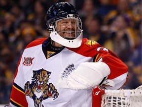 Tim Thomas of the Florida Panthers laughs following a save in the first period against the Boston Bruins during the game at TD Garden on March 4, 2014 in Boston, Massachusetts. (Jared Wickerham/Getty Images/AFP)
