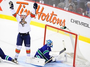 Former Vancouver Canucks goaltender Roberto Luongo gets scored on by his new team, the Florida Panthers, during this game on Nov. 19, 2013. OBSERVER FILE PHOTO