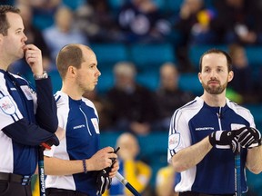 Team Nova Scotia skip Jamie Murphy (left), second Mike Bardsley and third Jordan Pinder were one of two teams relegated at the Brier in Kamloops, B.C., on Wednesday, March 5, 2014. (Ben Nelms/Reuters)
