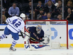 Maple Leafs center Tyler Bozak (42) scores a penalty shot goal against New York Rangers goalie Henrik Lundqvist (30) during the second period at Madison Square Garden on Wednesday night. (Adam Hunger-USA TODAY Sports)
