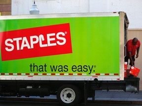 A Staples truck delivers office supplies in San Diego, California in this file photo taken September 24, 2013. REUTERS/Mike Blake/Files