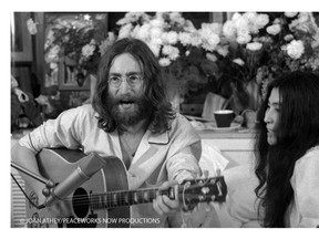 John Lennon and Yoko Ono sing Give Peace A Chance in room 1742 at the Queen Elizabeth Hotel in Montreal on May 26, 1969. (Photo Curtesy of Joan Athey/Peaceworks Now Productions)