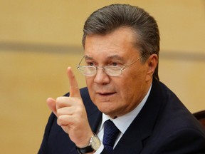 Ousted Ukrainian President Viktor Yanukovich takes part in a news conference in the southern Russian city of Rostov-on-Don on Feb. 28. Yanukovich, appearing in public for the first time since he was ousted as Ukraine's president, said he would not give up the fight for his country's future.  
REUTERS/Maxim Shemetov