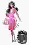 2006 Diane von Furstenberg Barbie  Doll Barbie has done a series of designer collaborations, but the Diane von Furstenberg Barbie  is complete with monogrammed luggage and passport, which makes it awesome. Barbie shows off the designer's jet-setting style, including her signature wrap dress. (Courtesy of Mattel)
